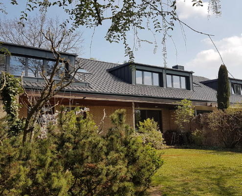 Dachmodernisierung mit Gauben – Referenz Dachmodernisierung mit Gauben im Zuge einer Gebäudemodernisierung