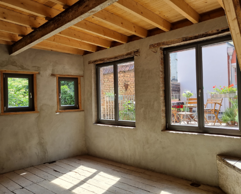 Modernisierung – Referenz Innenmodernisierung eines Bestandsgebäudes mit Holzbalkendecke