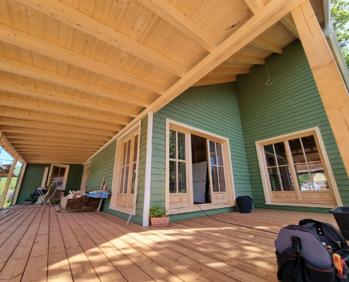 Holzrahmenbau – Referenz Einfamilienhaus in Holzrahmenbauweise mit Holzfassade und Holzterrasse