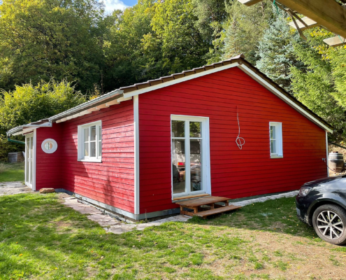 Wohngebäude in Holzrahmenbauweise – Referenz Kleines Wohngebäude in Holzrahmenbauweise mit Holzfassade